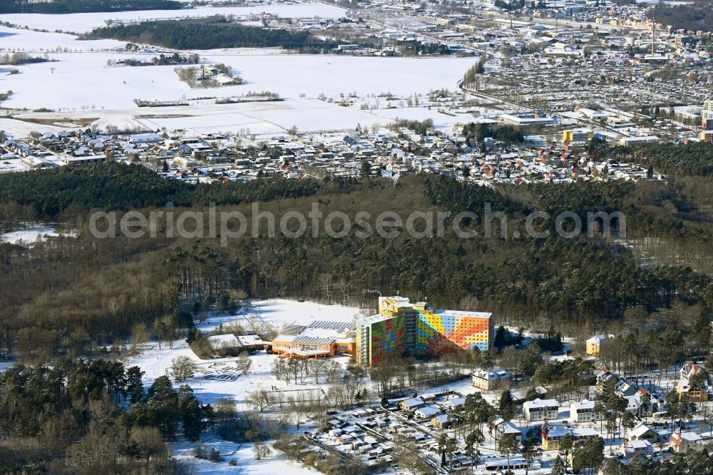 Aerial photograph Templin - Wintry snowy complex of the hotel building AHORN Seehotel Templin Am Luebbesee in Templin in the state Brandenburg, Germany