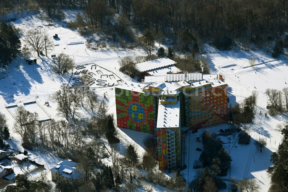 Templin from the bird's eye view: Wintry snowy complex of the hotel building AHORN Seehotel Templin Am Luebbesee in Templin in the state Brandenburg, Germany