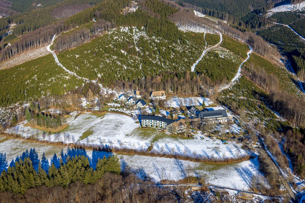 Aerial image Schmallenberg - Wintry snowy complex of the hotel building Berghotel Hoher Knochen in the district Langewiese in Schmallenberg in the state North Rhine-Westphalia, Germany