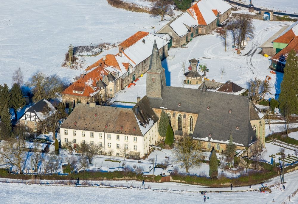 Arnsberg from above - Wintry snowy Complex of buildings of the monastery Oelinghausen in the district Holzen in Arnsberg in the state North Rhine-Westphalia