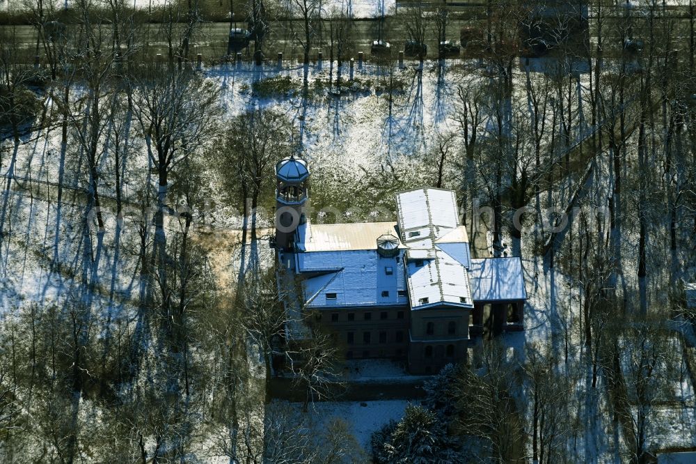 Aerial photograph Berlin - Wintry snowy building complex in the park of the castle Biesdorf in Berlin, Germany