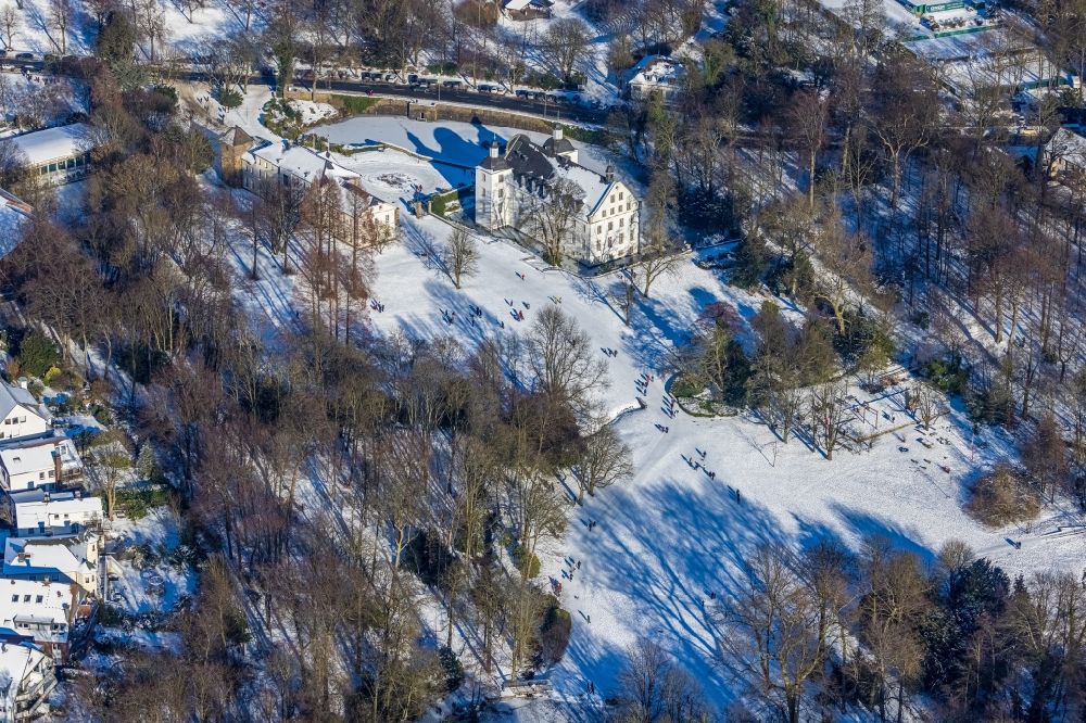 Aerial image Essen - Wintry snowy building complex in the park of the castle Borbeck in Essen in the state North Rhine-Westphalia, Germany