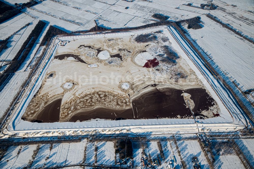 Aerial photograph Hammah - Wintry snowy site of the red mud disposal site in Hammah in the state Lower Saxony, Germany. The red mud is a waste product resulting from the extraction of alumina