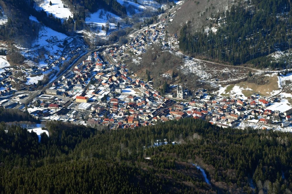 Todtnau from above - Wintry snowy city area of Todtnau with Catholic St. Johannes Baptist Church in the Black Forest in the state Baden-Wurttemberg, Germany