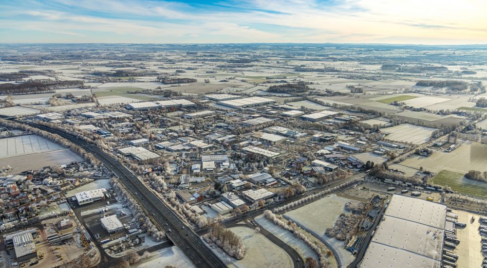 Aerial photograph Rhynern - Wintry snowy industrial estate and company settlement in Rhynern at Ruhrgebiet in the state North Rhine-Westphalia, Germany