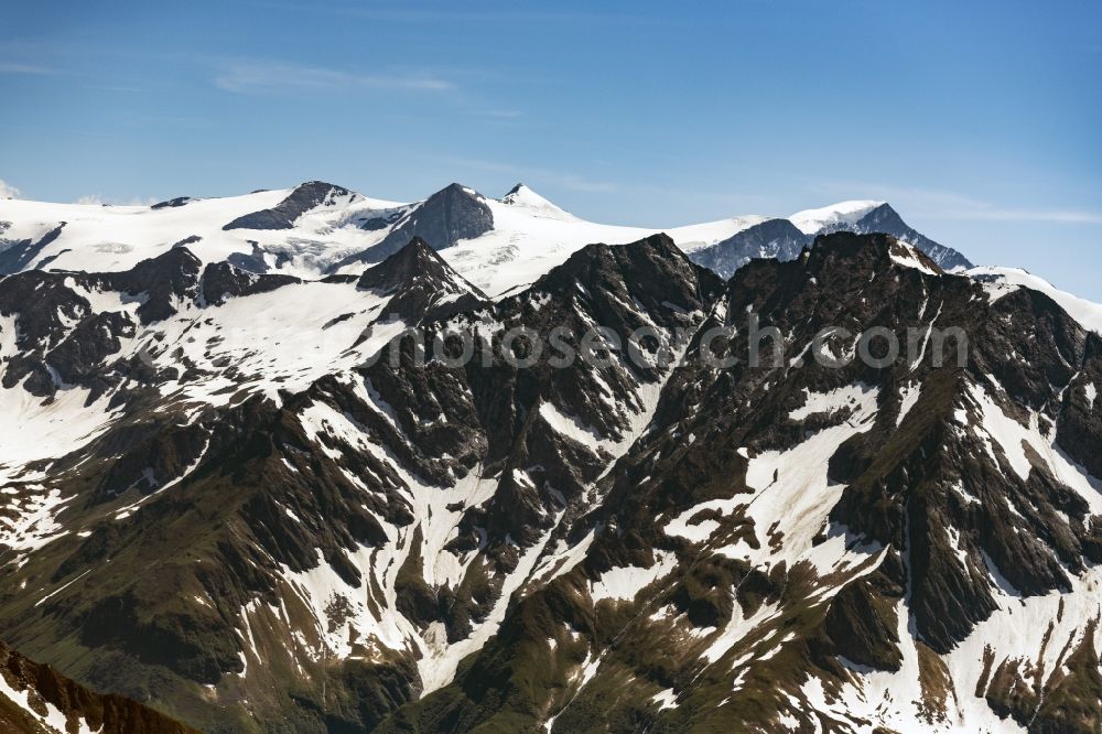 Aerial image Mittersill - Wintry snowy rocky and mountainous landscape the Alps in Mittersill in Salzburg, Austria