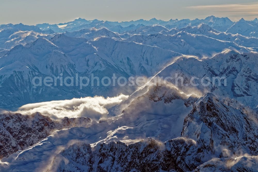Leutasch from the bird's eye view: Winter aerial view Peaks and ridges with snowdrifts in the backlight in the rock and mountain landscape of the Alps near Seefeld in Tirol in Austria