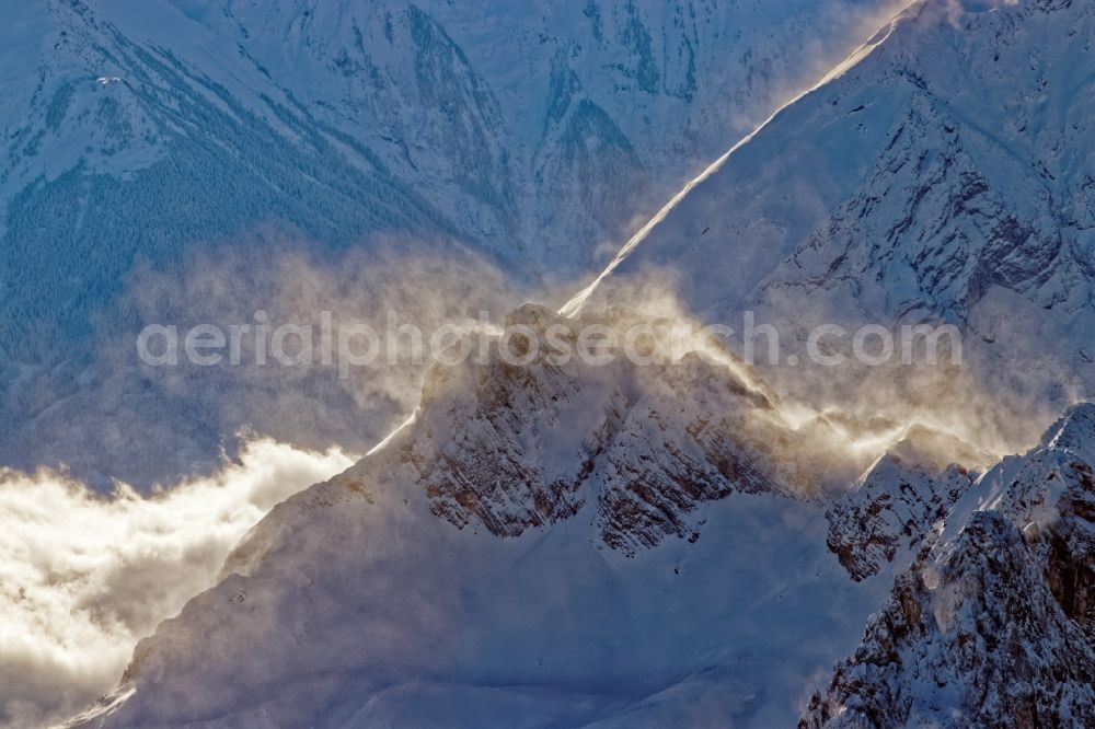 Aerial image Leutasch - Winter aerial view Peaks and ridges with snowdrifts in the backlight in the rock and mountain landscape of the Alps near Seefeld in Tirol in Austria