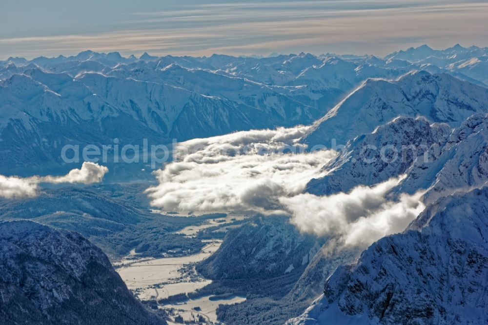 Aerial photograph Leutasch - Winter aerial view Peaks and ridges with snowdrifts in the backlight in the rock and mountain landscape of the Alps near Seefeld in Tirol in Austria