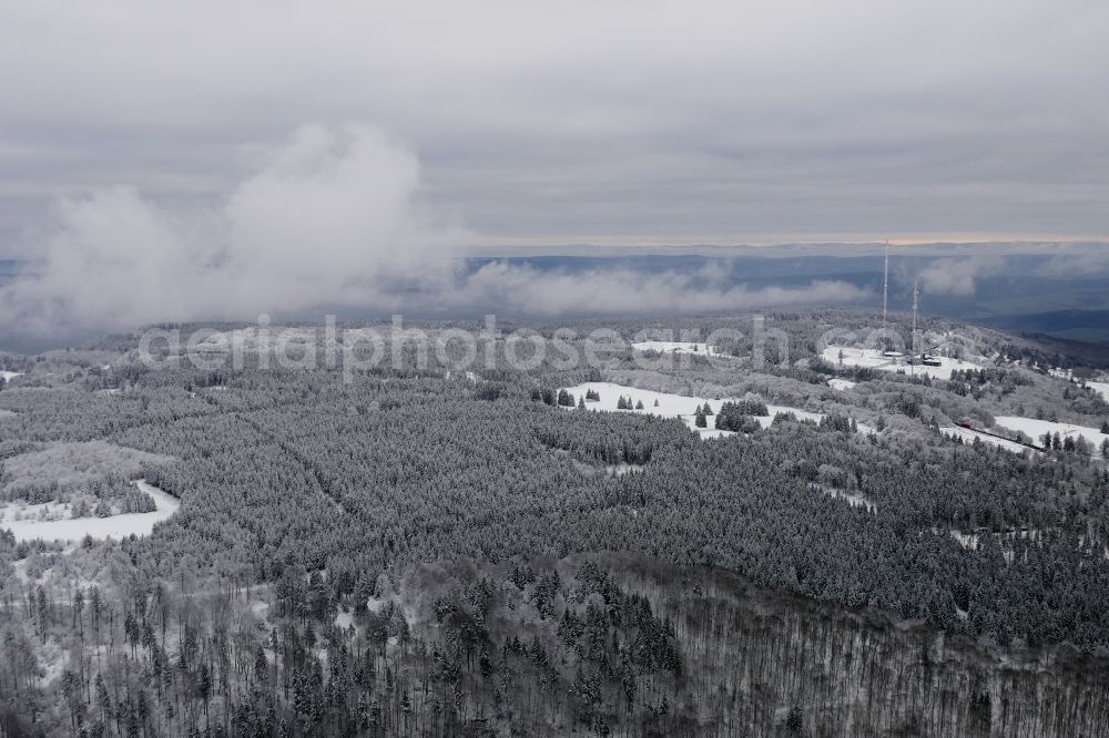 Hessisch Lichtenau from the bird's eye view: Wintry snowy white and snowy peaks of Hoher Meissner in the rocky and mountainous landscape in the district Hausen in Hessisch Lichtenau in the state Hesse