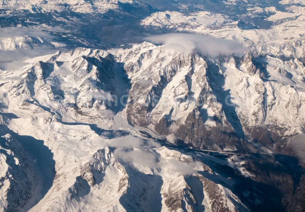 Departement Haute-Savoie from the bird's eye view: Wintry snowy rocky and mountainous landscape of Mont Blanc in Auvergne-Rhone-Alpes, France