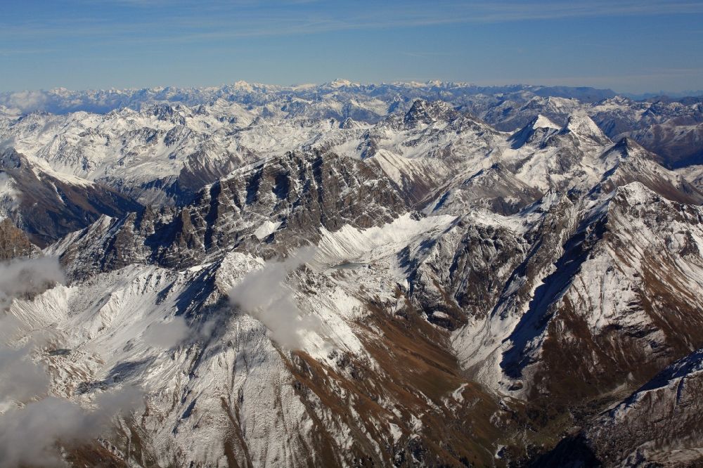 Aerial image Mulegns - Wintry snowy summits arround Piz Platta in the landscape of the Swiss Alps in the the canton Grisons, Switzerland