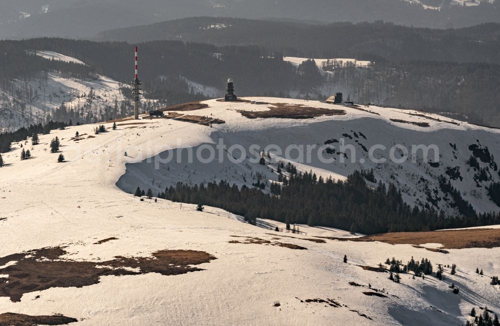 Feldberg (Schwarzwald) from above - Wintry snowy mountainous landscape of the summit of Feldberg mountain with the ski sports area and parcour at the World Cup of Ski Cross in Feldberg (Schwarzwald) in the state Baden-Wurttemberg, Germany