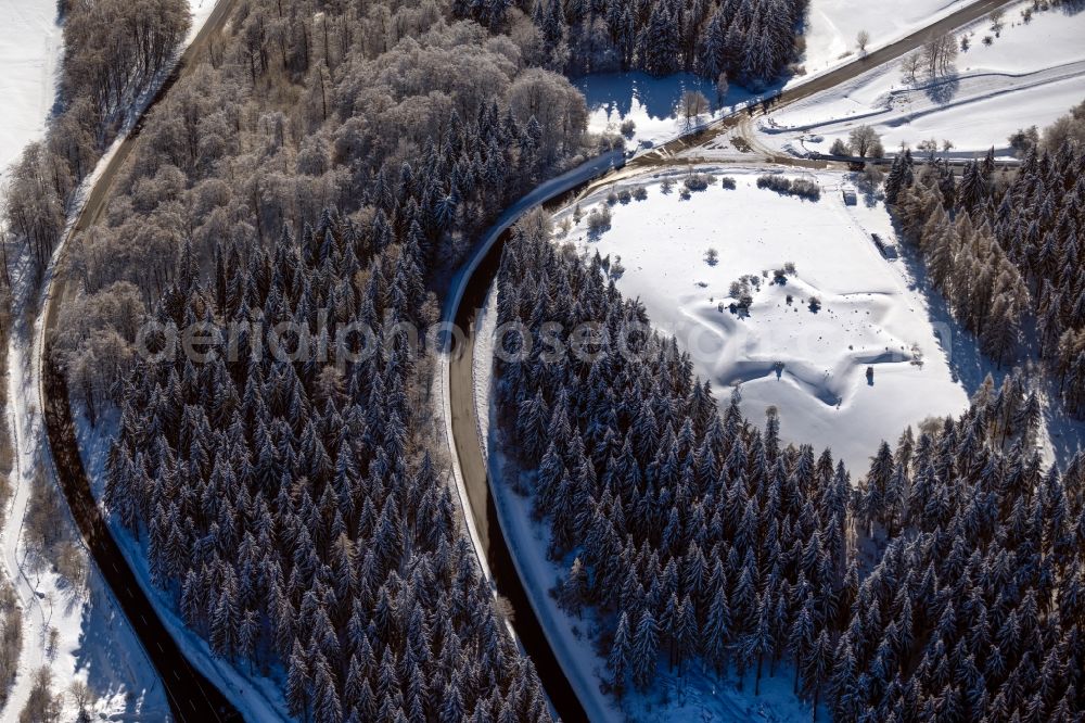 Aerial photograph Gersfeld (Rhön) - Wintry snowy structures of a field landscape of star-shaped Schwedenschanze in Gersfeld (Rhoen) in the state Hesse, Germany