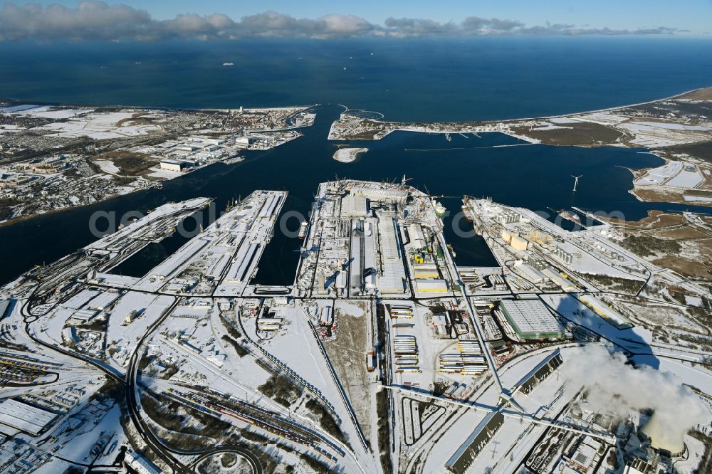 Rostock from above - Wintry snowy port facilities on the shores of the harbor of of Seehafen of ROSTOCK PORT GmbH in the district Peez in Rostock at the baltic sea coast in the state Mecklenburg - Western Pomerania, Germany