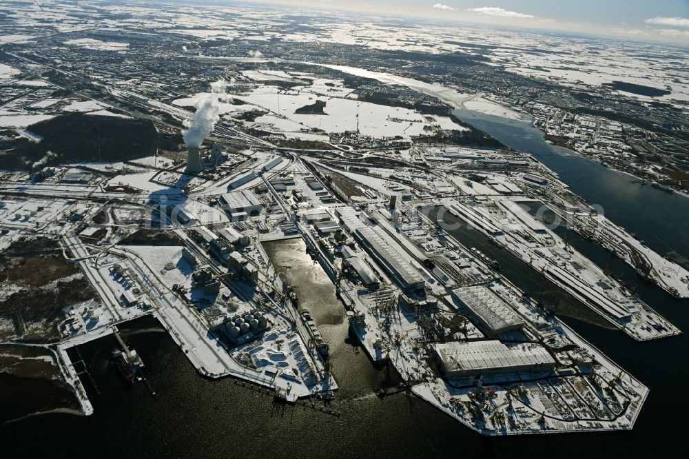 Aerial image Rostock - Wintry snowy port facilities on the shores of the harbor of of Seehafen of ROSTOCK PORT GmbH in the district Peez in Rostock at the baltic sea coast in the state Mecklenburg - Western Pomerania, Germany