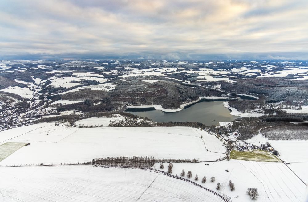 Aerial image Meschede - Wintry snowy reservoir of the Hennesee in Meschede in the state North Rhine-Westphalia, Germany