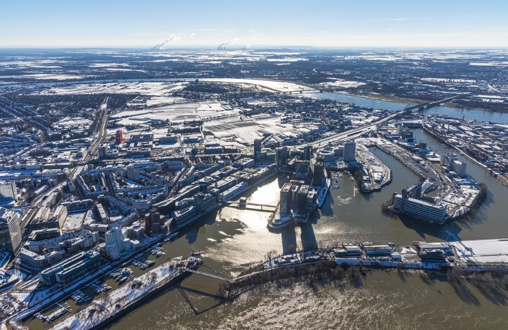 Düsseldorf from above - Wintry snowy high-rise building complex Duesseldorfer Heimathafen of the project WIN WIN on Speditionstrasse in Duesseldorf at Ruhrgebiet in the state North Rhine-Westphalia, Germany