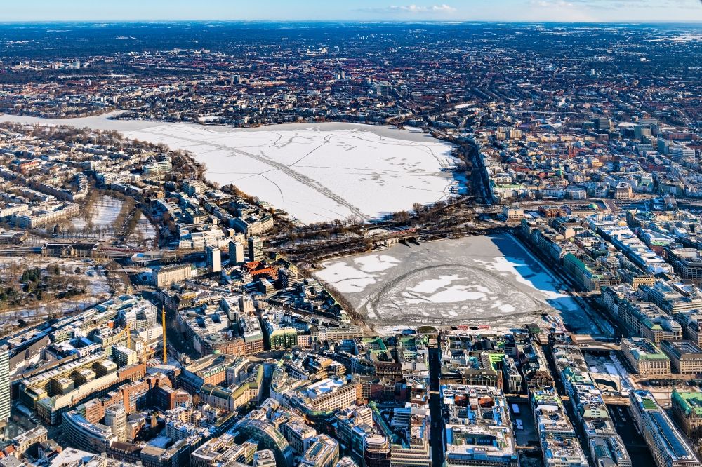 Hamburg from above - Wintry snowy city view of the downtown area on the shore areas of Binnenalster in Hamburg, Germany