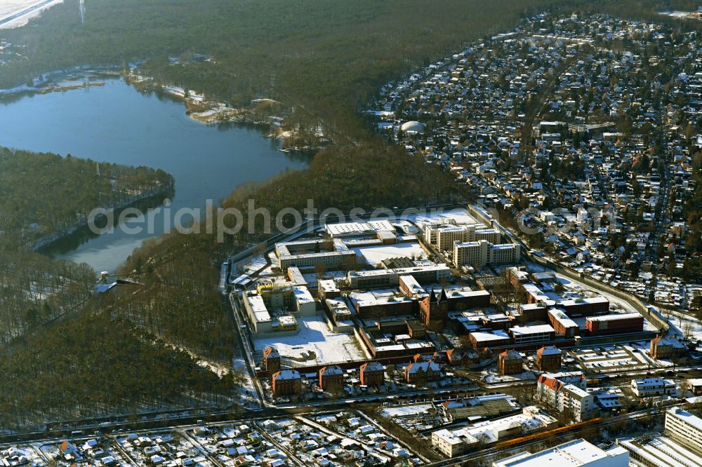 Aerial image Berlin - Wintry snowy prison grounds and high security fence Prison Tegel on Seidelstrasse in the district Reinickendorf in Berlin, Germany