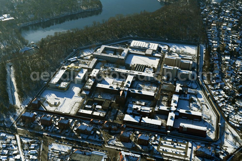 Aerial image Berlin - Wintry snowy prison grounds and high security fence Prison Tegel on Seidelstrasse in the district Reinickendorf in Berlin, Germany