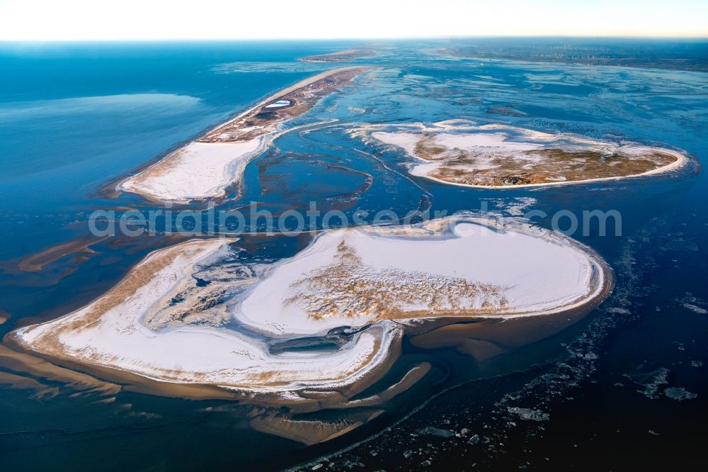 Aerial image Juist - Wintry snowy view of the sandbank Kachelotplate near the North Sea island Juist in Lower Saxony