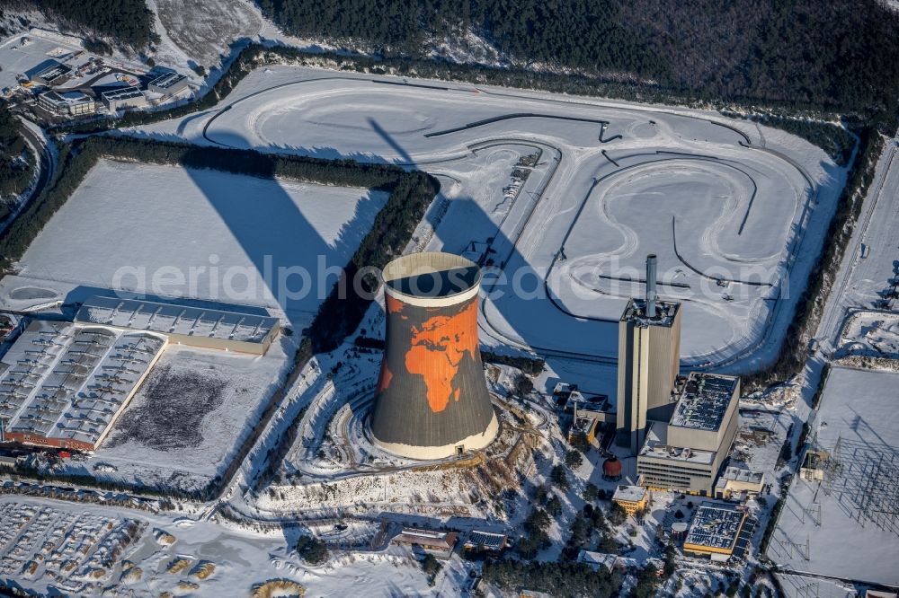 Meppen from the bird's eye view: Wintry snowy cooling tower on the site of the former power station Meppen-Huentel in Lower Saxony