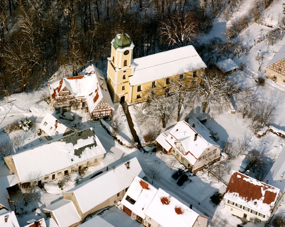 Türkheim from the bird's eye view: Wintry snowy church building of the evangelical Vituskirche in Kirchgasse in Turkheim in the state Baden-Wuerttemberg, Germany