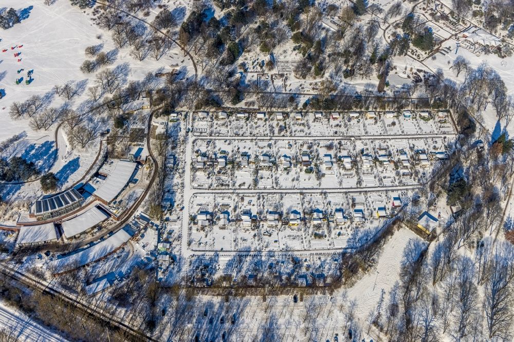 Dortmund from the bird's eye view: Wintry snowy allotments gardens plots of the association - the garden colony An der Buschmuehle at the Westfalenpark Dortmund in the district Ruhrallee Ost in Dortmund at Ruhrgebiet in the state North Rhine-Westphalia, Germany