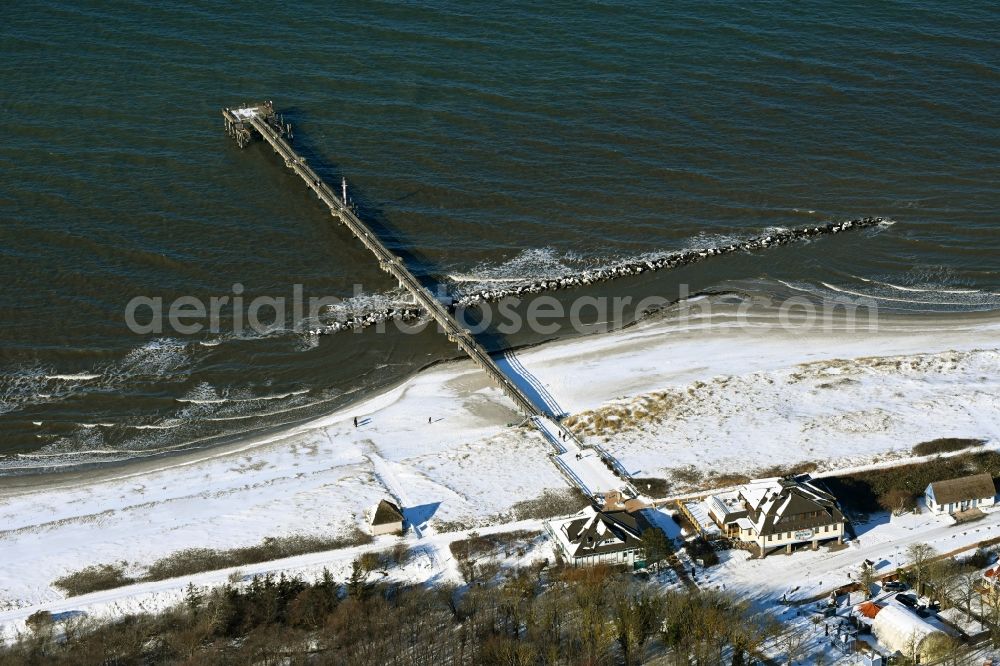 Aerial photograph Wustrow - Wintry snowy running surfaces and construction of the pier over the water surface . in Wustrow in the state Mecklenburg - Western Pomerania, Germany