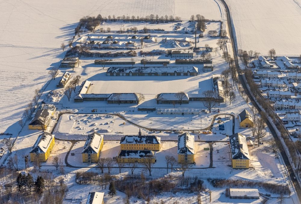 Soest from above - Wintry snowy conversion construction site Building complex of the former military barracks in Soest in the state of North Rhine-Westphalia, Germany