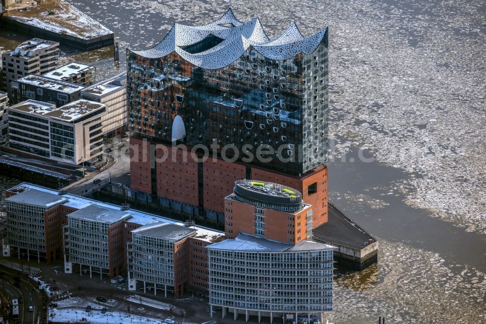 Hamburg from above - Wintry snowy the Elbe Philharmonic Hall on the river bank of the Elbe in the district HafenCity in Hamburg