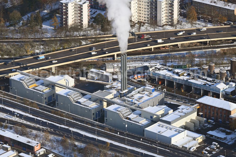 Berlin from the bird's eye view: Wintry snowy power plants and exhaust towers of thermal power station Wilmersdorf on street Forckenbeckstrasse in the district Schmargendorf in Berlin, Germany
