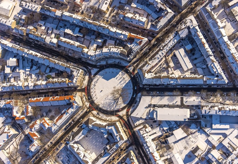 Aerial photograph Dortmund - Wintry snowy traffic management of the roundabout road Borsigstrasse - Wambeler Strasse in the district Borsigplatz in Dortmund in the state North Rhine-Westphalia, Germany