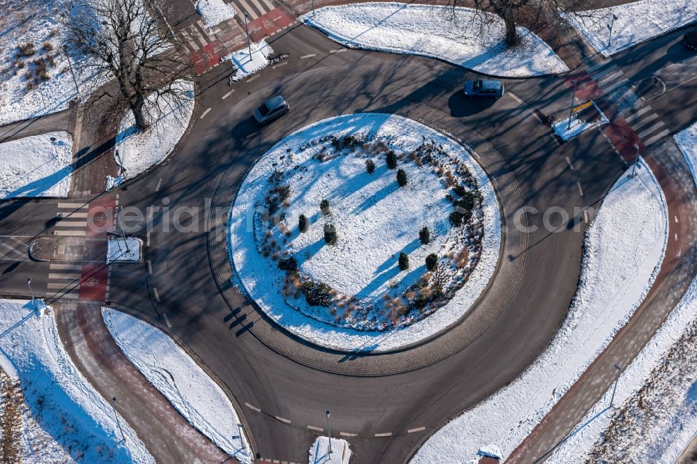Stade from above - Wintry snowy traffic management of the roundabout road in Stade in the state Lower Saxony, Germany