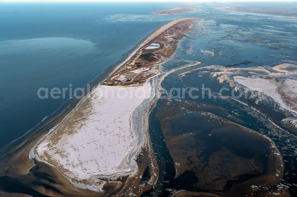 Aerial image Juist - Wintry snowy coastal area of North Sea - Island in Juist in the state Lower Saxony, Germany