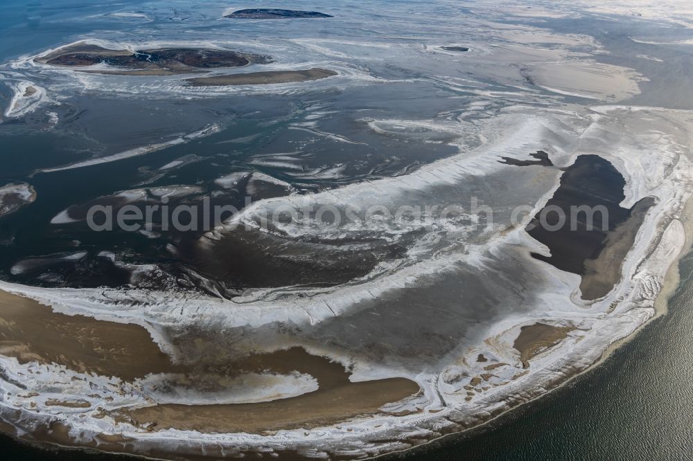 Nigehörn from above - Wintry snowy coastal area of the North Sea - Island in Scharhoern in the state Hamburg