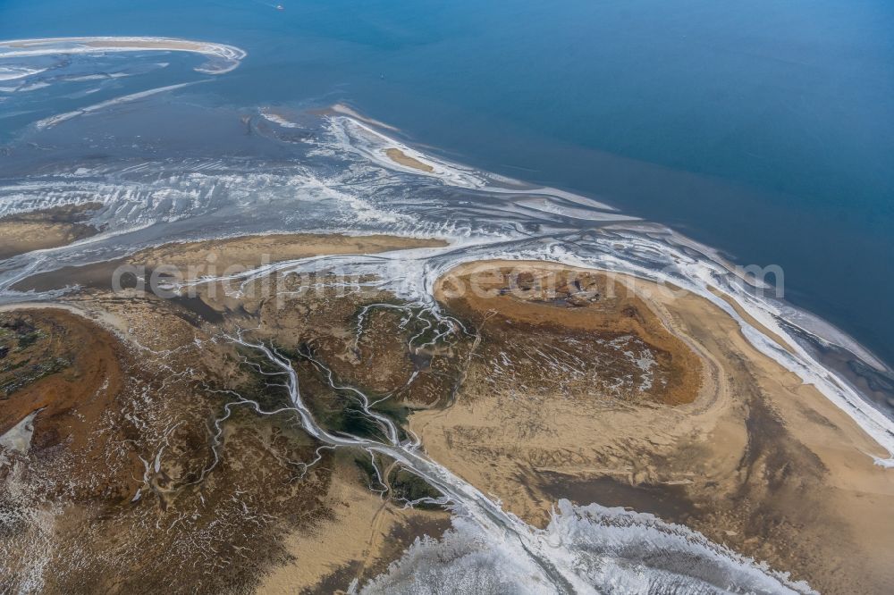 Nigehörn from above - Wintry snowy coastal area of the North Sea - Island in Scharhoern in the state Hamburg
