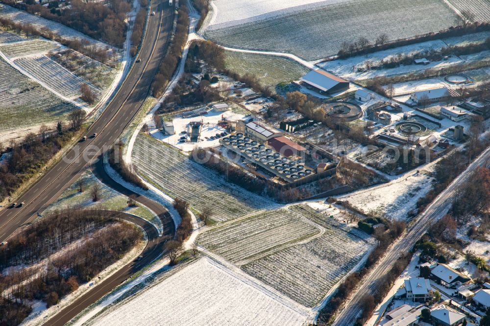 Insheim from the bird's eye view: Wintry snowy power plants of thermal power station Geothermiekraftwerk on street Hinter der Sandgrube in Insheim in the state Rhineland-Palatinate, Germany