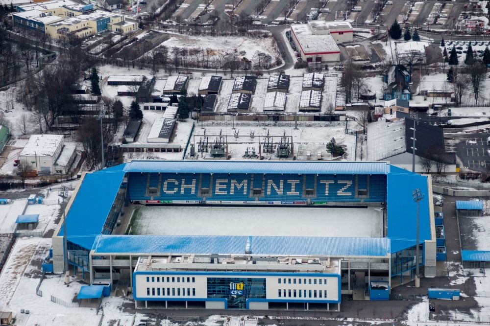 Chemnitz from the bird's eye view: Wintry snowy new building of the football stadium community4you ARENA of FC Chemnitz in Saxony