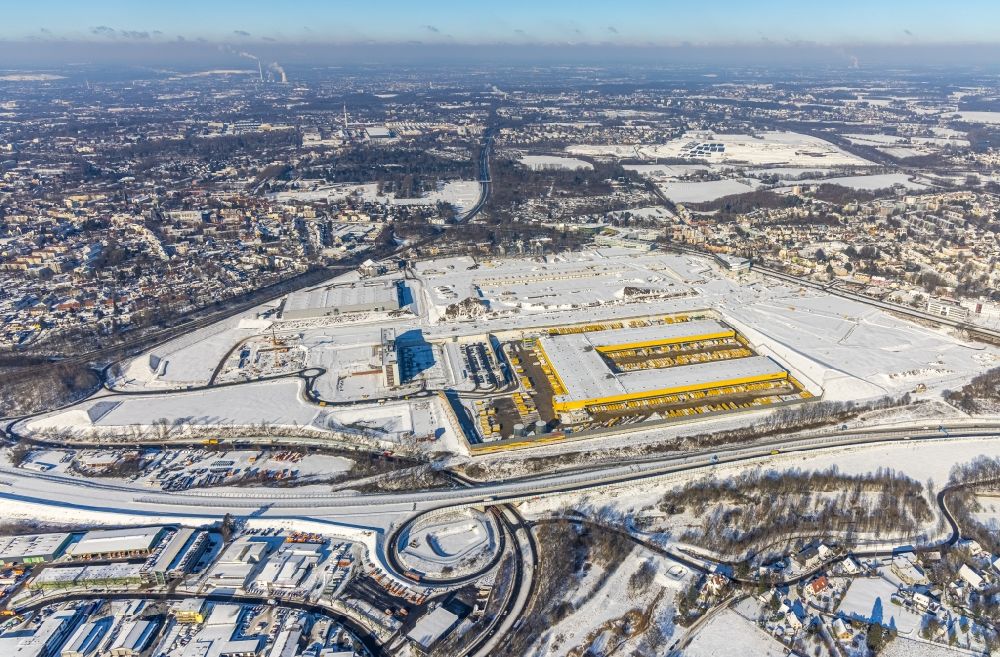 Aerial photograph Bochum - Wintry snowy construction site to build a new building complex on the site of the logistics center in the development area MARK 51A?7 in Bochum in the state North Rhine-Westphalia, Germany
