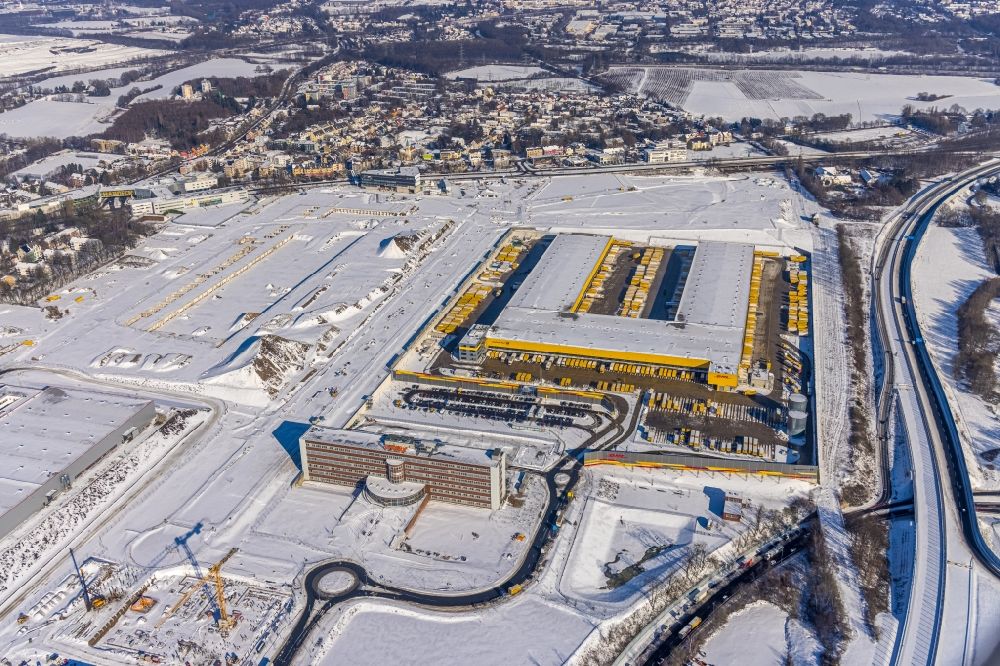 Bochum from the bird's eye view: Wintry snowy construction site to build a new building complex on the site of the logistics center in the development area MARK 51A?7 in Bochum in the state North Rhine-Westphalia, Germany