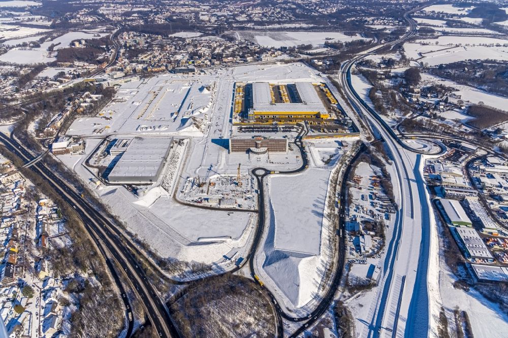 Aerial image Bochum - Wintry snowy construction site to build a new building complex on the site of the logistics center in the development area MARK 51A?7 in Bochum in the state North Rhine-Westphalia, Germany