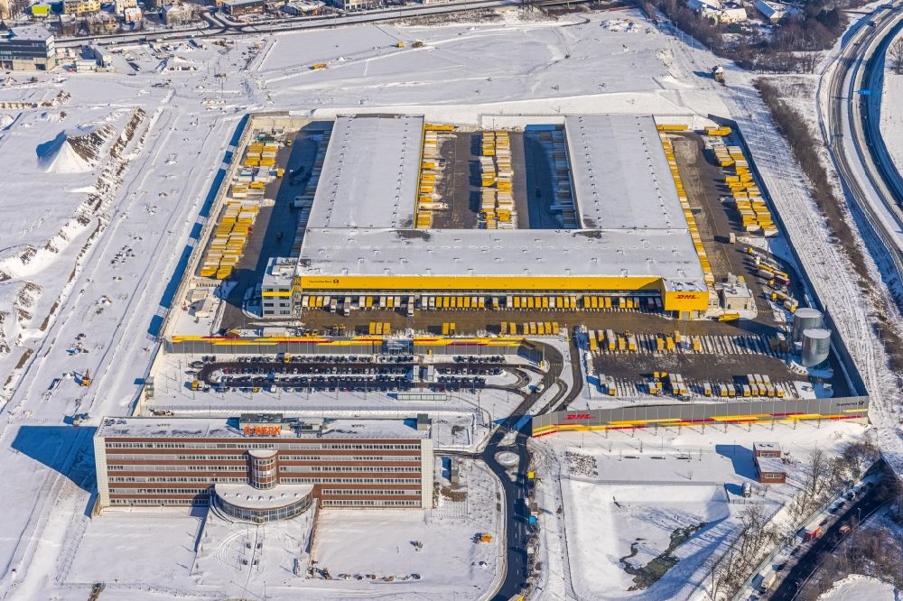 Bochum from above - Wintry snowy construction site to build a new building complex on the site of the logistics center in the development area MARK 51A?7 in Bochum in the state North Rhine-Westphalia, Germany