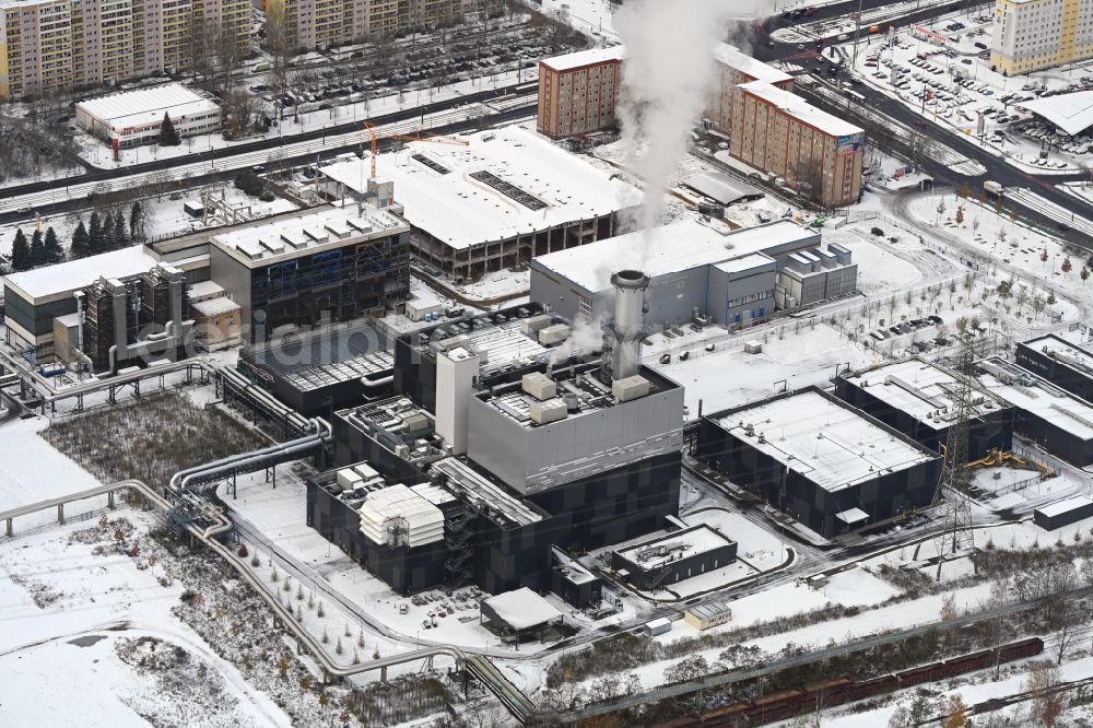 Berlin from above - Wintry snowy power plants and exhaust towers of thermal power station - Kraft-Waerme-Kopplungsanlage on Rhinstrasse in the district Marzahn in Berlin, Germany