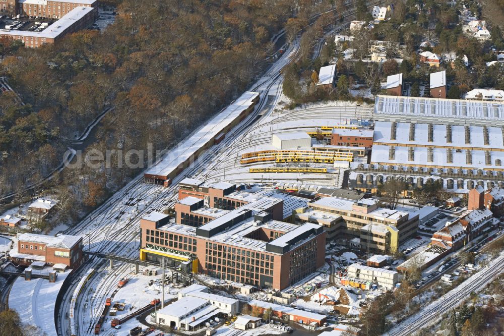 Aerial photograph Berlin - Wintry snowy railway depot and repair shop for maintenance and repair of trains the Berlin subway in the district Charlottenburg Westend in Berlin, Germany