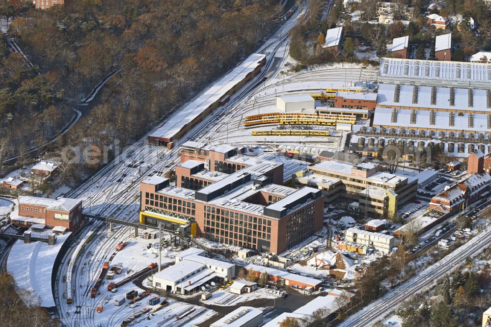 Aerial image Berlin - Wintry snowy railway depot and repair shop for maintenance and repair of trains the Berlin subway in the district Charlottenburg Westend in Berlin, Germany