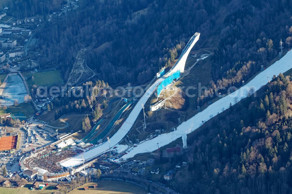 Aerial photograph Garmisch-Partenkirchen - Wintry snowy training and competitive sports center of the ski jump Grossen Olympiaschanze on Karl-und Martin-Neuner-Platz in Garmisch-Partenkirchen in the state Bavaria, Germany