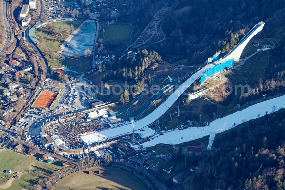 Garmisch-Partenkirchen from above - Wintry snowy training and competitive sports center of the ski jump Grossen Olympiaschanze on Karl-und Martin-Neuner-Platz in Garmisch-Partenkirchen in the state Bavaria, Germany