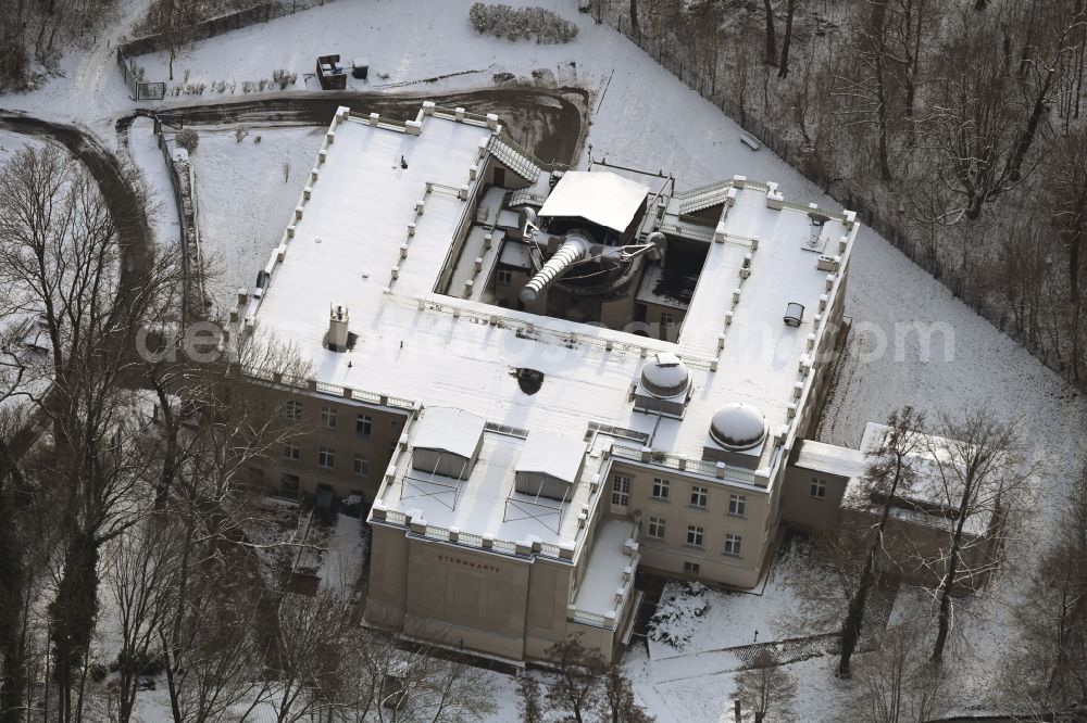 Aerial image Berlin - Wintry snowy observatory and Planetariumskuppel- constructional building complex of the Institute Archenhold Sternwarte in Alt-Treptow in the district Treptow in Berlin, Germany